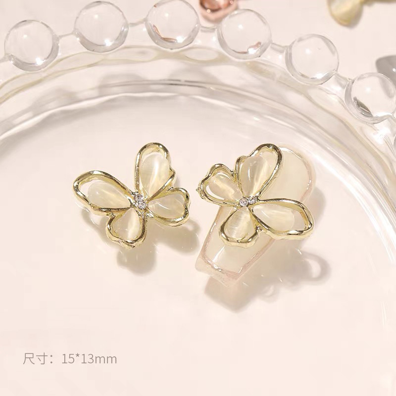蝶の形をしたネイルジュエリー5個、新しい豪華な合金製の3Dネ - Nova Decor & Lighting Julestjerne のレビューと価格